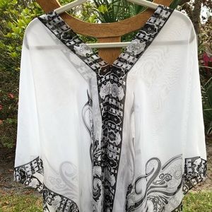 Sheer lace over throw for beach or for tanks